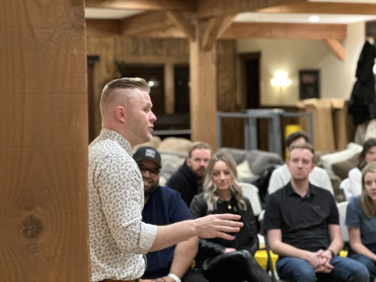 Clint Pulver teaching a group of people about his life story